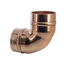 A bronze-colored copper 90deg. elbow solder fitting, approved for plumbing use.